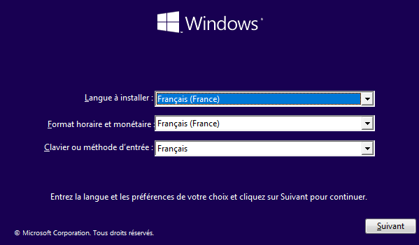 Fenêtre de sélection de la langue à installer, du format horaire et monétaire et du Clavier ou méthode d'entrée de l'installateur de Windows